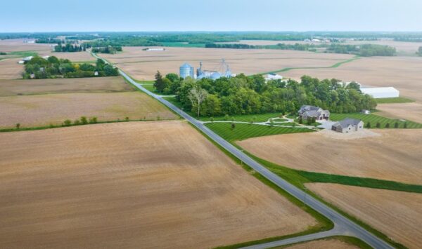 Modern Canadian farm showcasing advanced agriculture targeted by innovative farm insurance solutions.